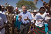 United States Ambassador to Kenya Bob Godec dances with residents of Napeikar after a meeting of the Napeikar Core Innovation Group in Turkana County on 29th March 2017. Through training carried out by the USAID Accelerated Value Chain Development and implemented by the International Livestock Research Institute in collaboration with the Turkana County Government, group members are equipped with improved livestock herd management knowledge. Photo Credit: USAID